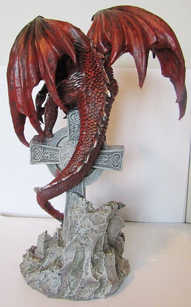 Red dragon on a large celtic cross Carousel 5