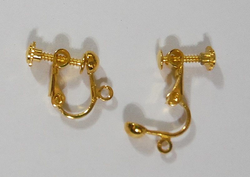 A PAIR of GOLD SCREW-ON EARRINGS Carousel 1