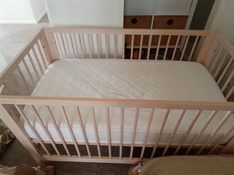Mocka light coloured cot with mattress Carousel 1
