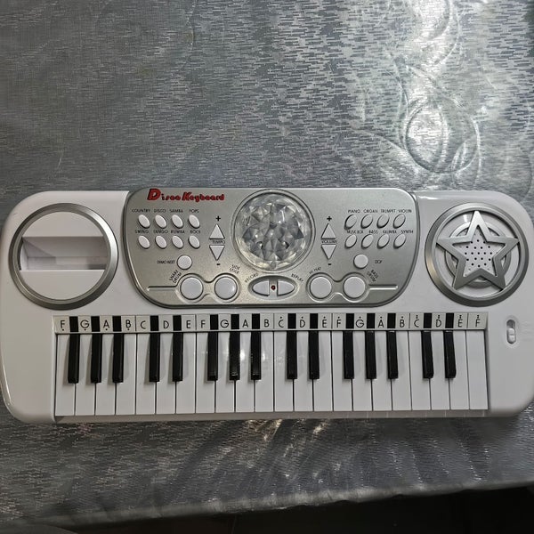 Kids Toy Keyboard Carousel 1