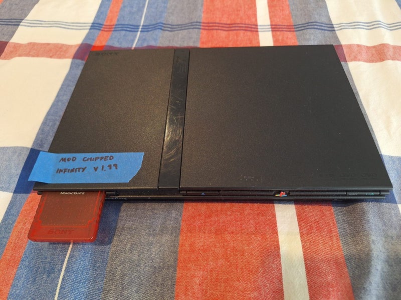PS2 Slim (Infinity v1.99 modchip) plus accessories Carousel 2