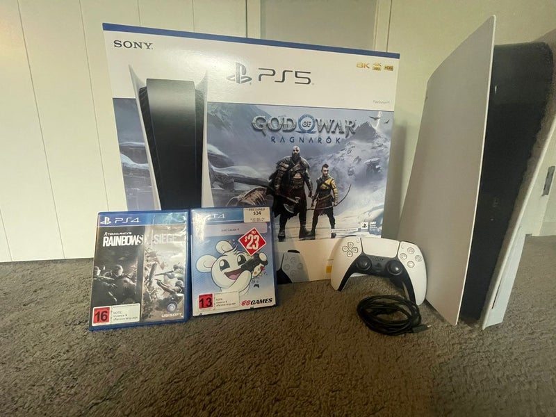 PS5 disk edition 825gb + 2 Games Carousel 1