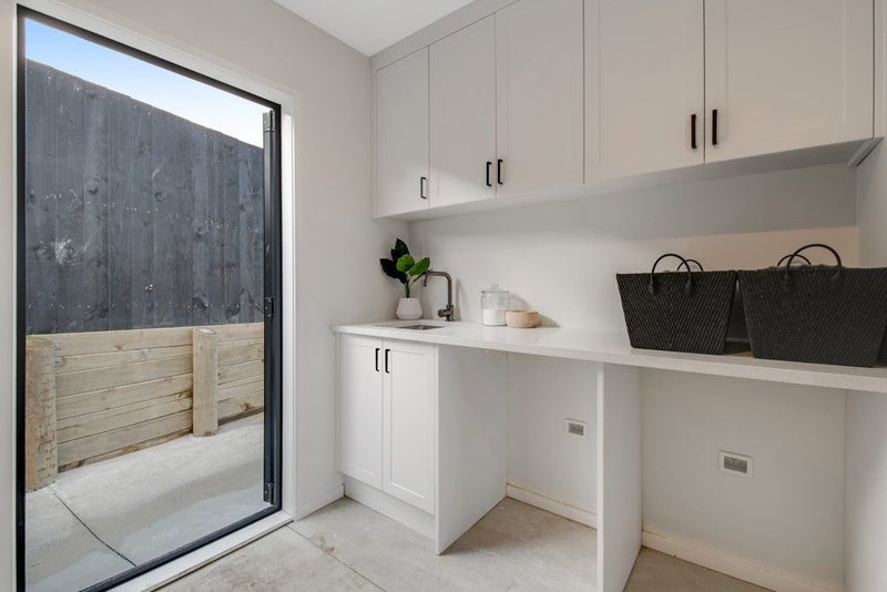 Shaker-Style Laundry with Engineered Stone Top Carousel 1
