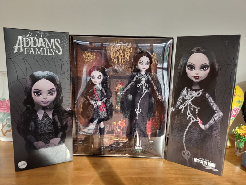 2 Pack-Monster High Skullector Addams Family Morticia and Wednesday Dolls Carousel 1
