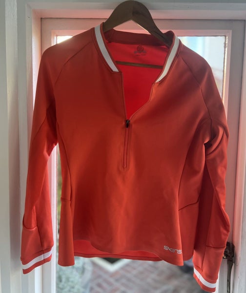 Like new! Skins 1/4 zip running top. Size Large Carousel 8