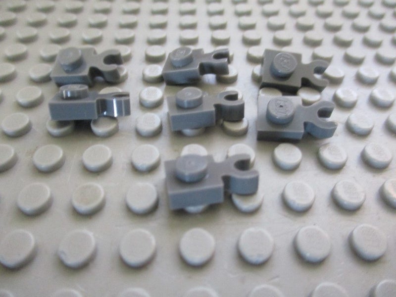1x1 Dark Grey Plates with Vertical Clip x 7 Carousel 1