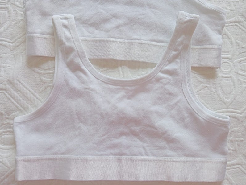 New. 2 x white crop tops with satin trim. Girls size 6 - 8. Carousel 2
