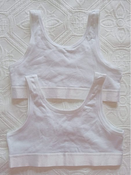 New. 2 x white crop tops with satin trim. Girls size 6 - 8. Carousel 1