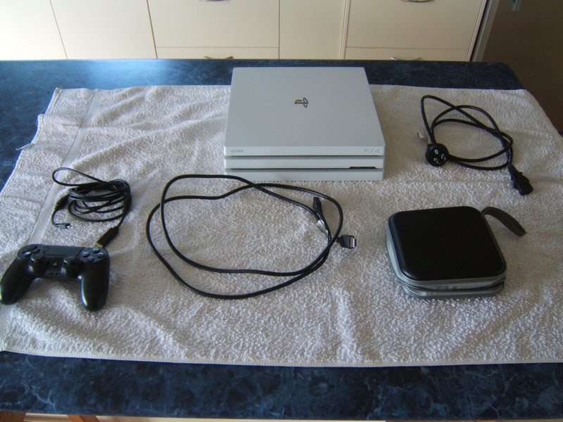 Playstation 4 Pro (Refurbished) + 18 Games Carousel 1