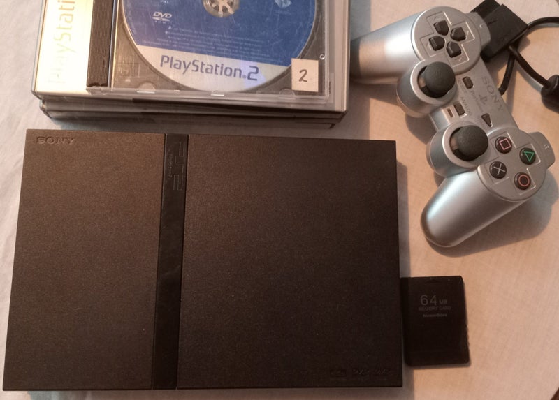 PS2 SLIMLINE CONSOLE + GAMES Carousel 1