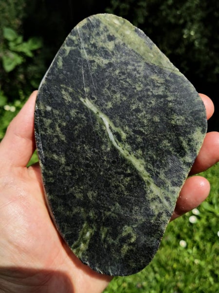 Pounamu greenstone carving Tiki slab Carousel 1