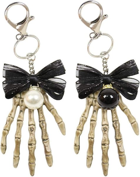 2pcs Creative Skull Hand Skeleton Keyring Key Chains Halloween Keyring Bowknot P Carousel 1