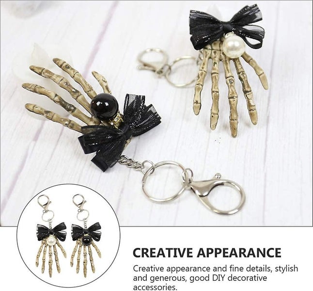 2pcs Creative Skull Hand Skeleton Keyring Key Chains Halloween Keyring Bowknot P Carousel 5