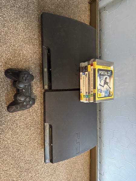 Two PlayStation 3 consoles and games bulk Carousel 1