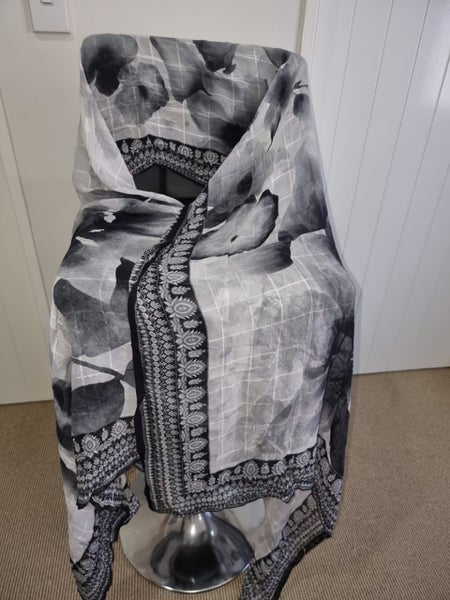 White n Black Printed Synthetic Blend Material 2.5 Mtr Width 100cm Carousel 2