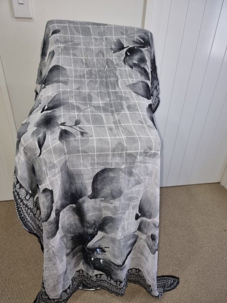 White n Black Printed Synthetic Blend Material 2.5 Mtr Width 100cm Carousel 1