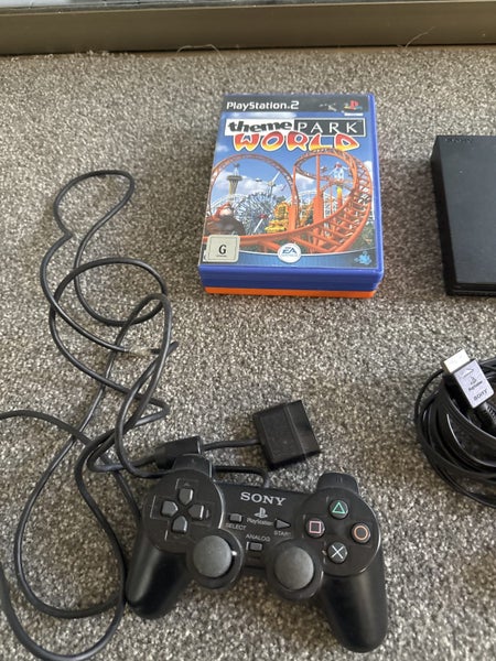 PlayStation 2 slim console with 3 games and controller Carousel 2