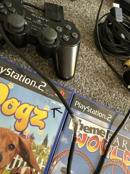 PlayStation 2 slim console with 3 games and controller Carousel 4