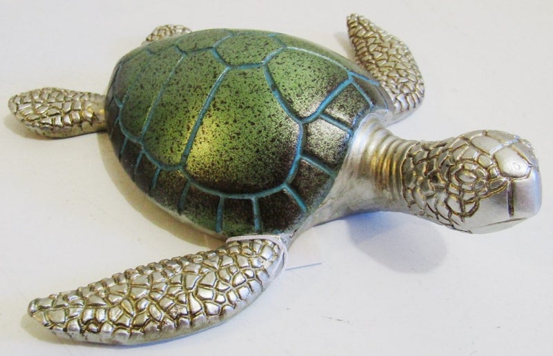 Turtle, jade and silver coloured finish, can be wall hung or free standing. Carousel 1