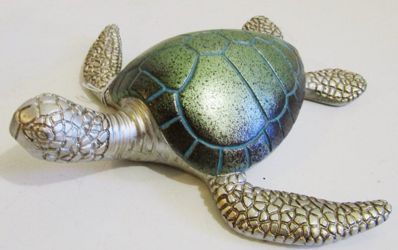 Turtle, jade and silver coloured finish, can be wall hung or free standing. Carousel 2