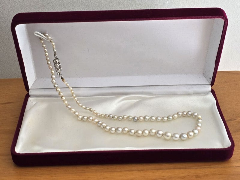 Edwardian natural saltwater pearl strand with 18ct gold,0.57ct old cut diamonds Carousel 1