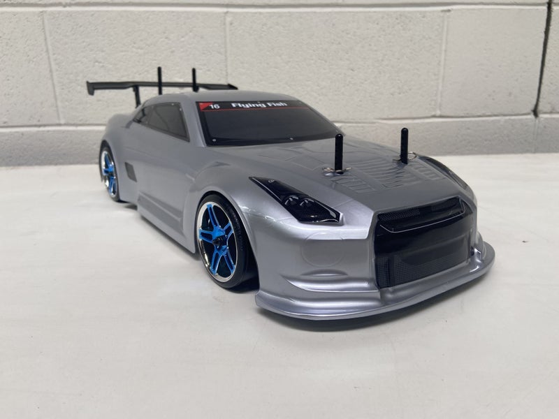 HSP Drift Car Nissan GTR . 1/10 Includes Bonus Battery, Wheels and Brace.62863857316739112