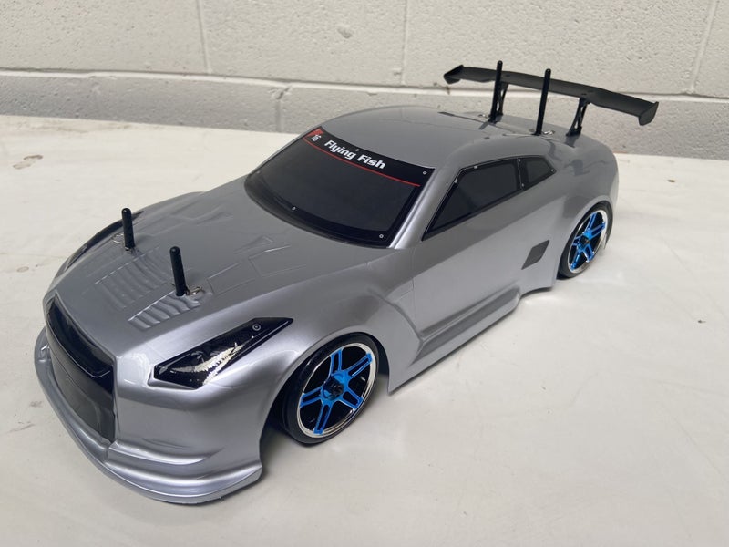 HSP Drift Car Nissan GTR . 1/10 Includes Bonus Battery, Wheels and Brace.62863857316739113