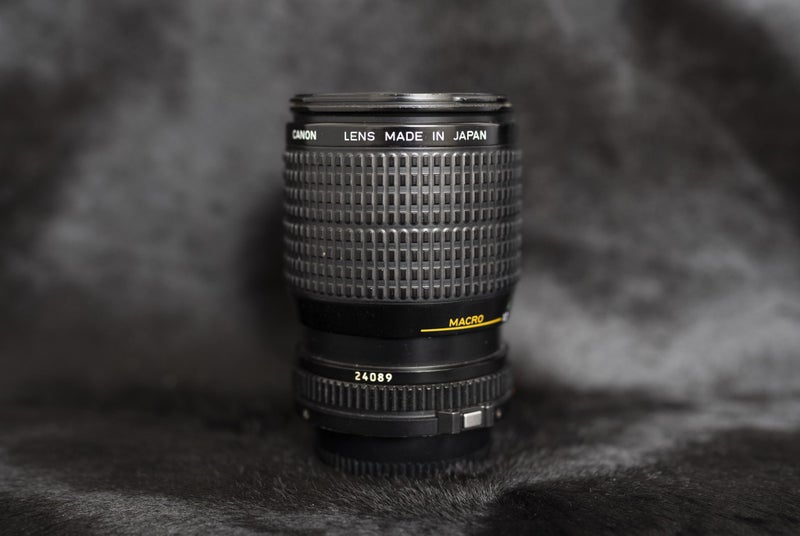 Canon NFD 35-105mm 3.5-4.5 zoom lens film camera lens Carousel 1