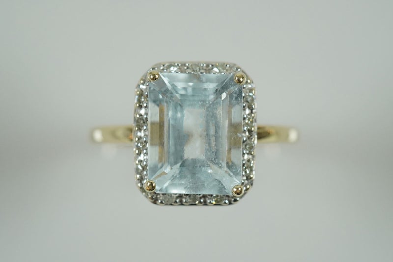 Enchanting Ocean Blue Aquamarine & Diamond 9ct Engagement ring Carousel 1