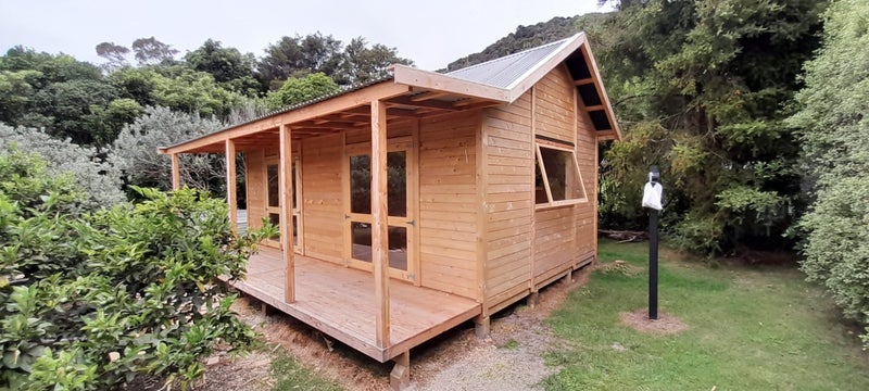 3.6m x 7.0m Kitset Cabin. NZ made. Cedar Cladding. Insulation. Timber Interior Carousel 1
