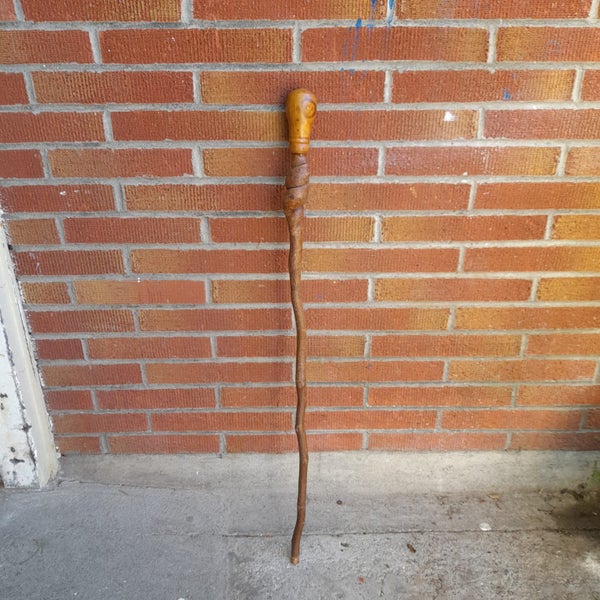 No.1 Locally carved walking stick Carousel 1