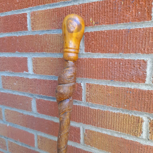 No.1 Locally carved walking stick Carousel 2
