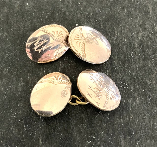 Double-sided gold cuff links. Carousel 1