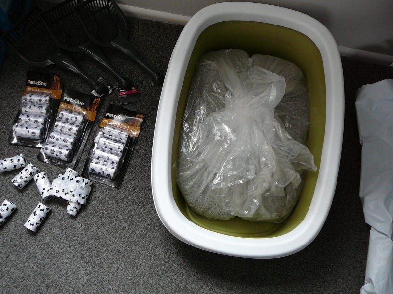 cat litter and cage Carousel 1