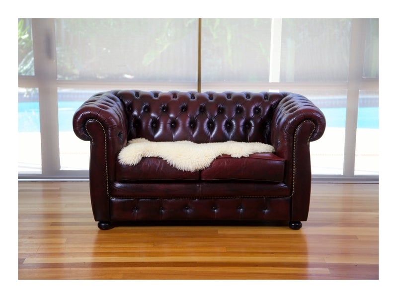 British Vintage 2-seater Chesterfield Leather Sofa Carousel 1