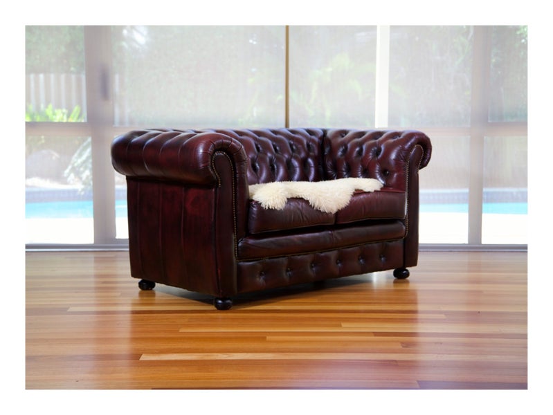 British Vintage 2-seater Chesterfield Leather Sofa Carousel 1