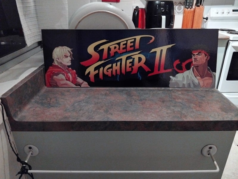 Street Fighter || Marquee ( Laminated on cardboard ) Carousel 1