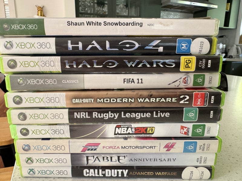 Xbox 360 box, 3 handsets and handful of games Carousel 2