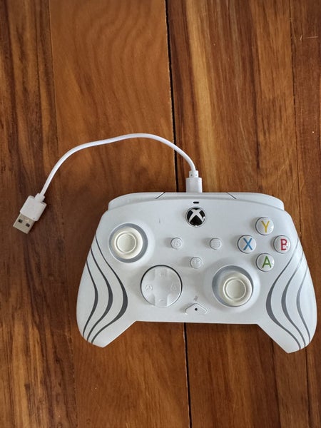 Xbox 360 box, 3 handsets and handful of games Carousel 5