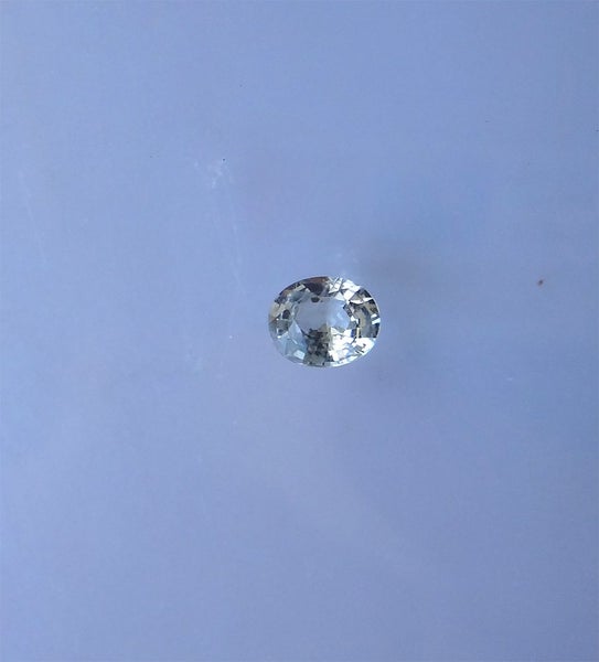 0.52 ct natural light yellow Sapphire #319 Carousel 1