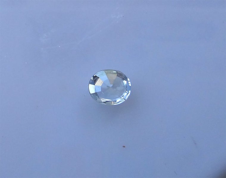 0.52 ct natural light yellow Sapphire #319 Carousel 3
