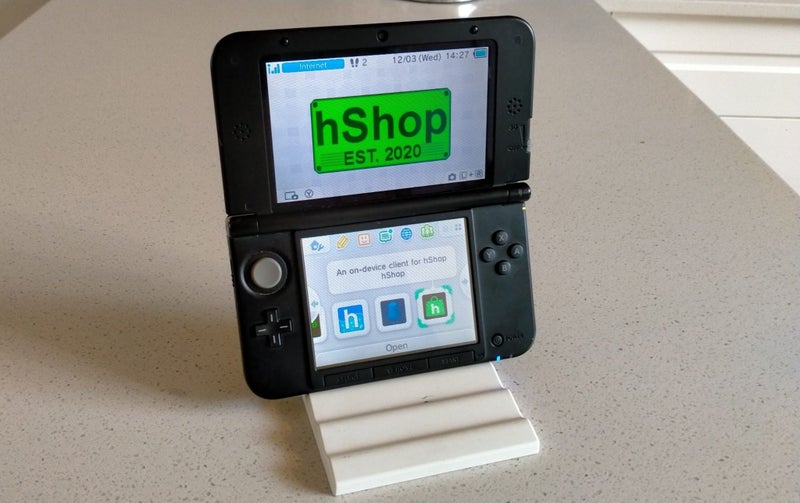 Modded Silver Nintendo 3DS XL with SD card mod Carousel 1