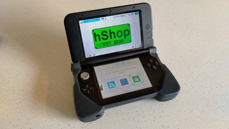 Modded Silver Nintendo 3DS XL with SD card mod Carousel 16