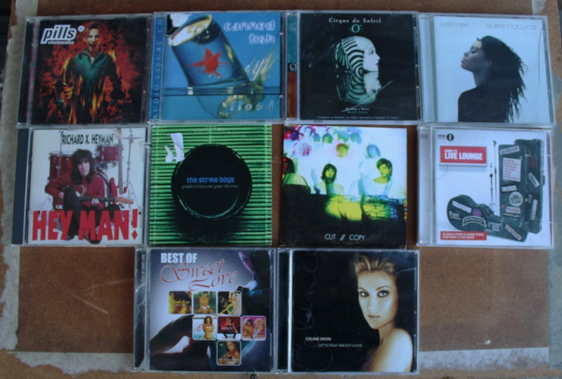 10 CDs. Quite a Mix of Artists Carousel 1