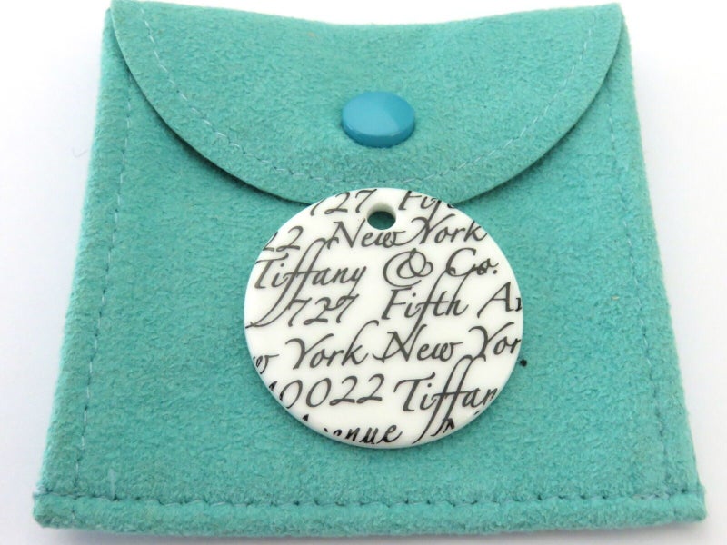 TIFFANY & CO White Bone Notes Round Charm Pendant Carousel 1