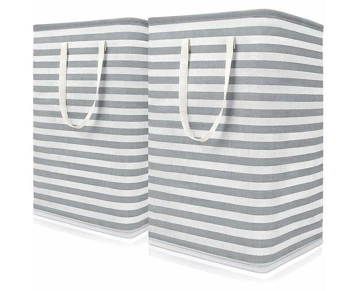 Two-pack set of large, free-standing laundry hampers with handles. Carousel 1