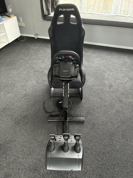 Playseat simulator chair with Logitech steering wheel and pedals Carousel 2