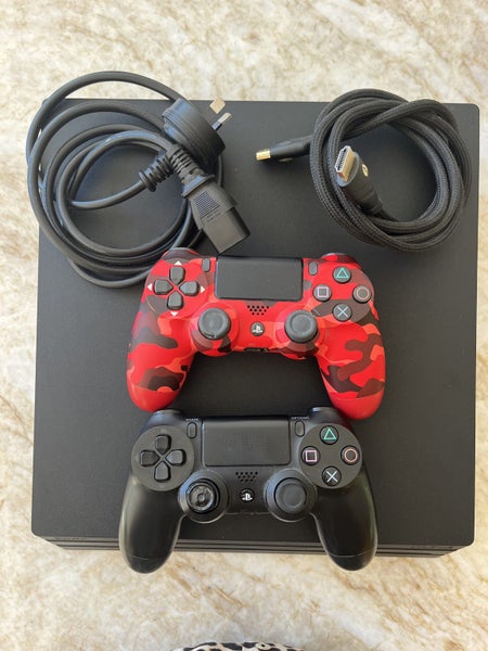 PS4 - Pro - 1TB plus 2 controller Carousel 1