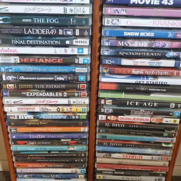 BULK LOT OF 70 DVDS IN SOLID WOOD STAND Carousel 1