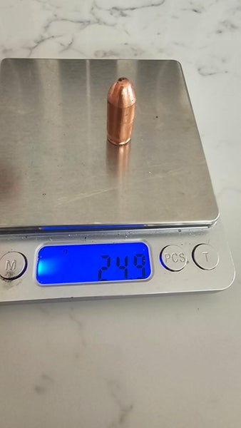 hand poured copper bullet. *not real bullet* Carousel 2